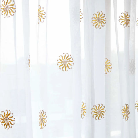 White Chanderi sheer curtain filtering natural light to create a bright and airy interior