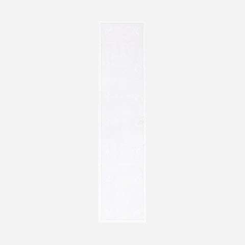Full-length white embroidered table runner featuring hand-embroidered wild floral motifs on a white cotton base displayed on a plain background