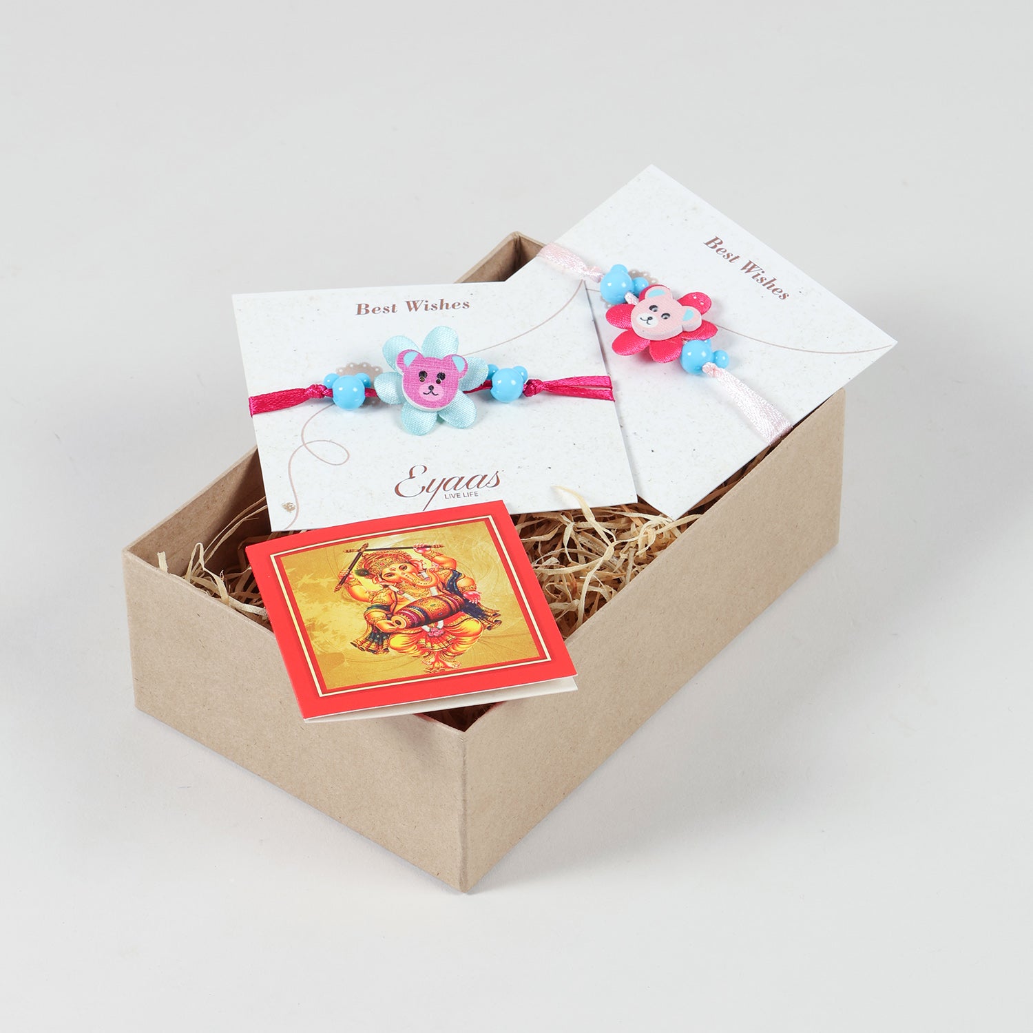 Wooden Teddy Bear Kids Rakhi Set of 2 in Blue & Pink neatly arranged inside a festive gift box, ready to delight little brothers
