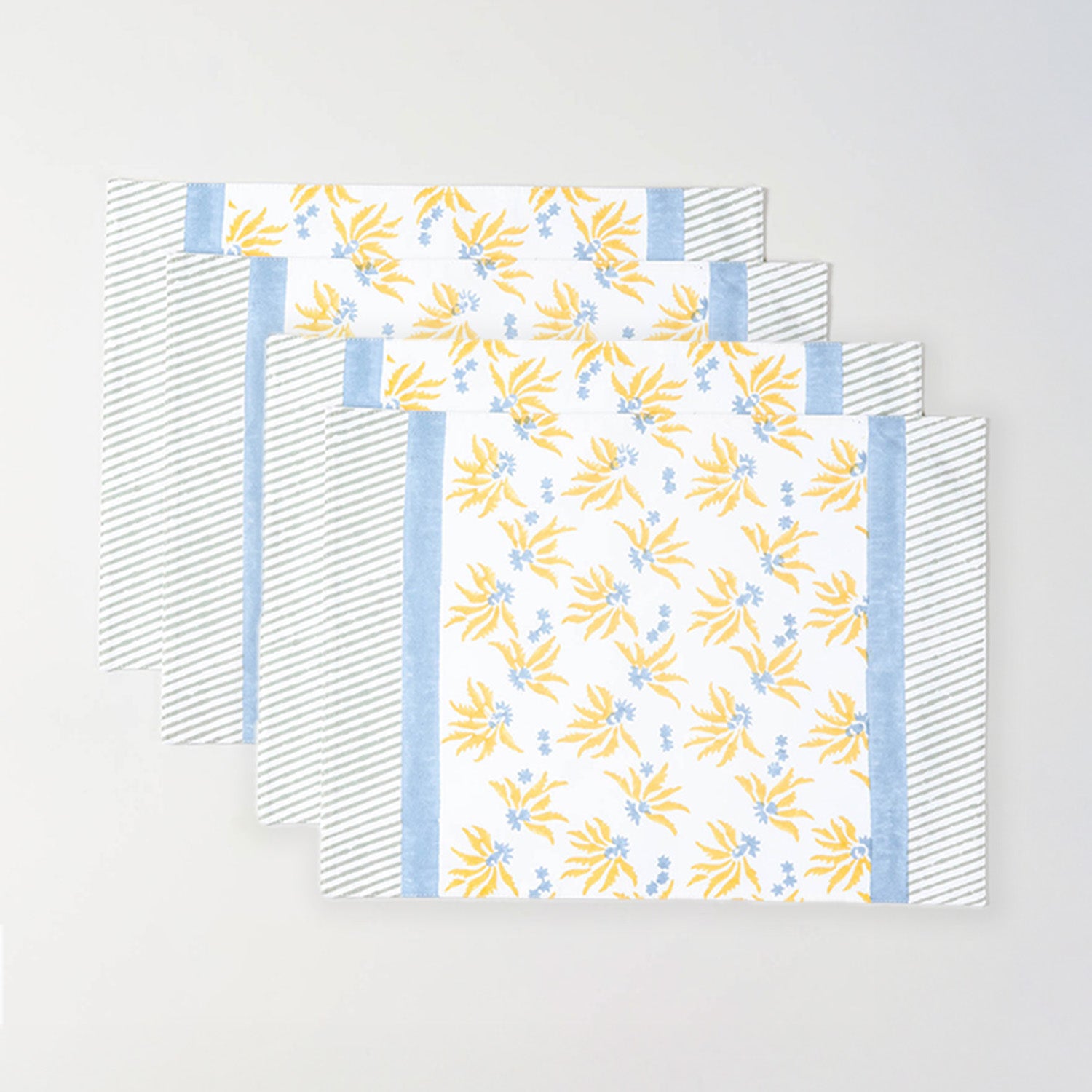 Set of four block printed cotton placemats with floral pattern for family dining and entertaining