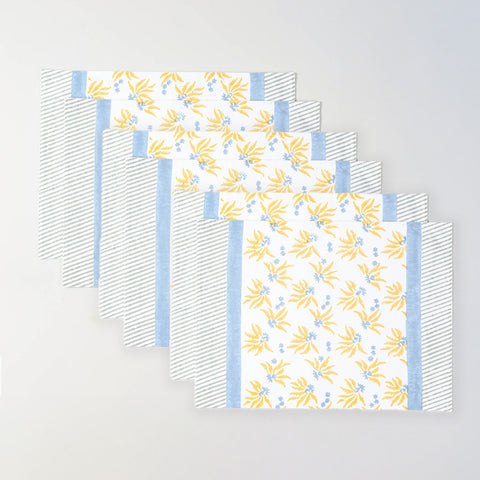 Pack of six floral cotton table mats in yellow and blue for gatherings and festive table settings