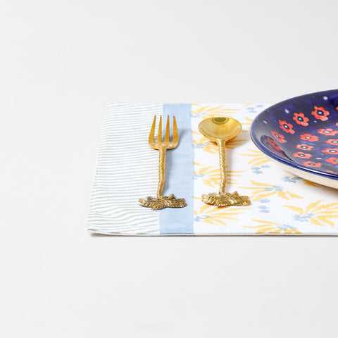 Single floral cotton placemat styled for dining table decor with handcrafted block printed design