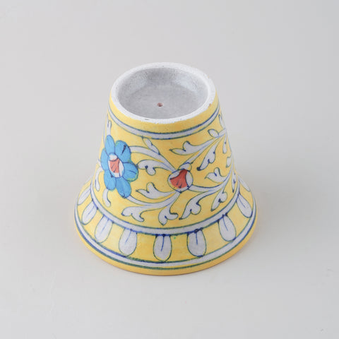 Upside down Jaipur Blue Pottery flower pot showing drainage hole