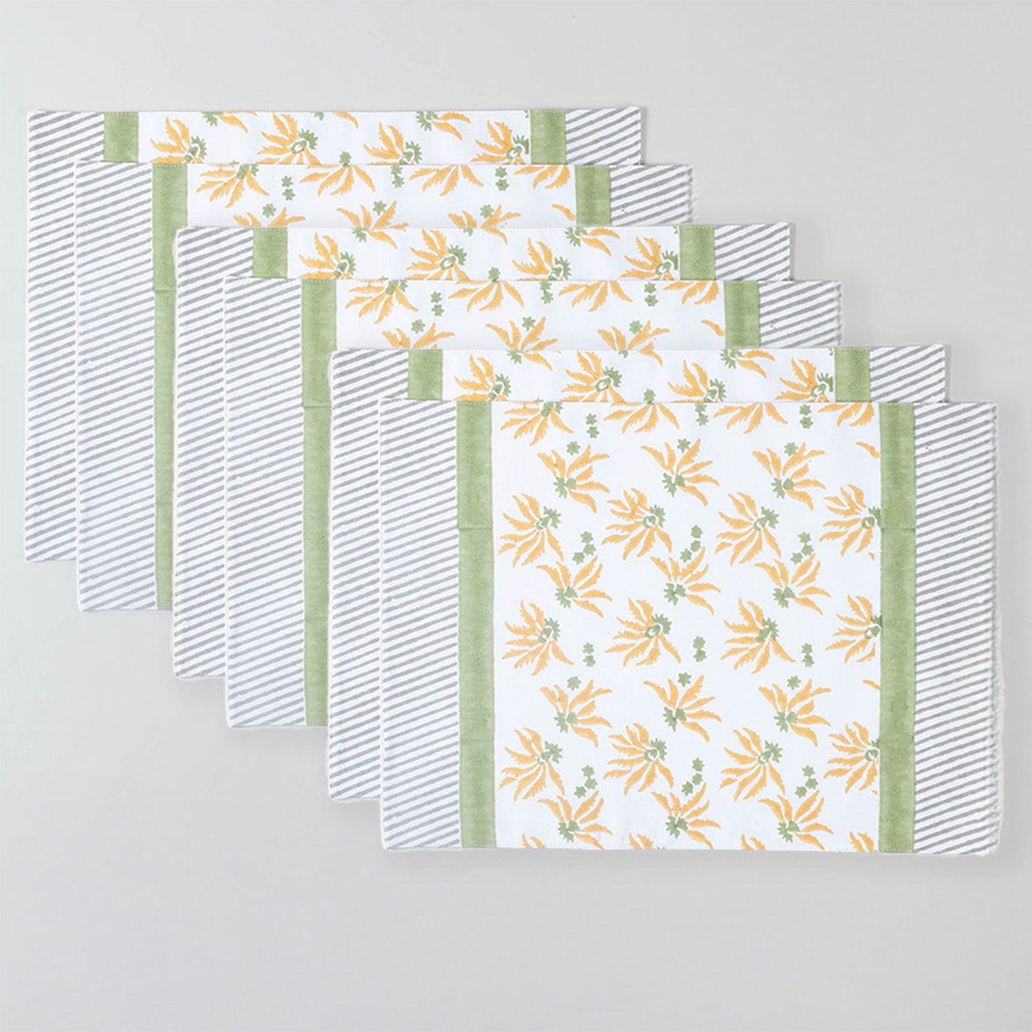 Pack of six cotton table mats featuring floral block print for entertaining and festive gatherings