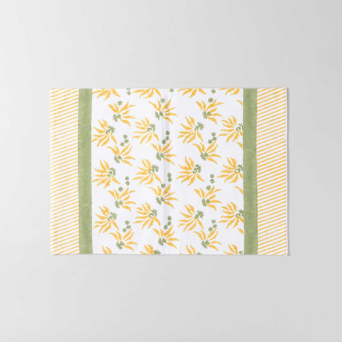 Full-size cotton placemat featuring yellow lily floral block print design on a white background