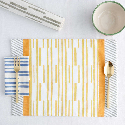 Single striped cotton placemat styled for modern dining table settings and decorative tablescapes
