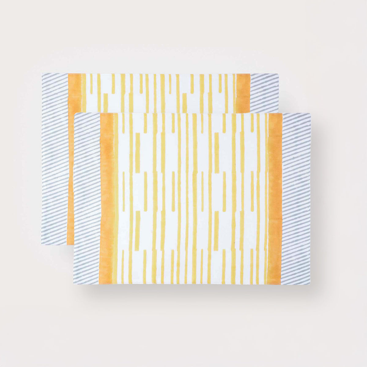 Yellow stripe cotton placemats set with handcrafted block printed detailing