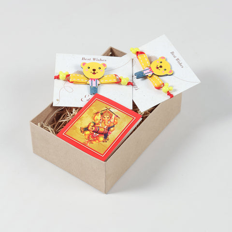 Yellow Teddy Bear Wooden Kids Rakhi Set of 2 neatly arranged inside a festive gift box for a thoughtful Raksha Bandhan surprise