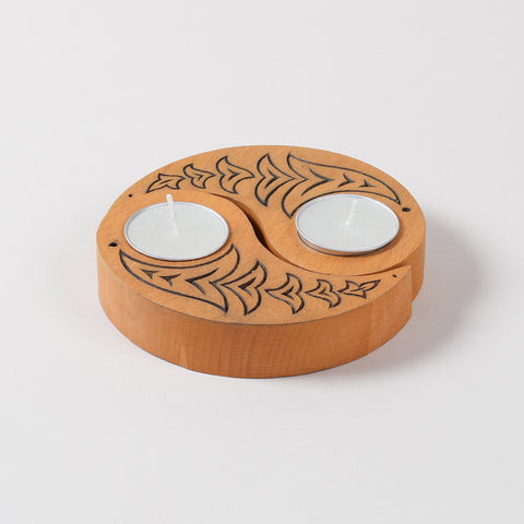Yellow wooden T-light holders set of 2 featuring hand carved bird motifs and Ying Yang design, displayed on a plain background without candles