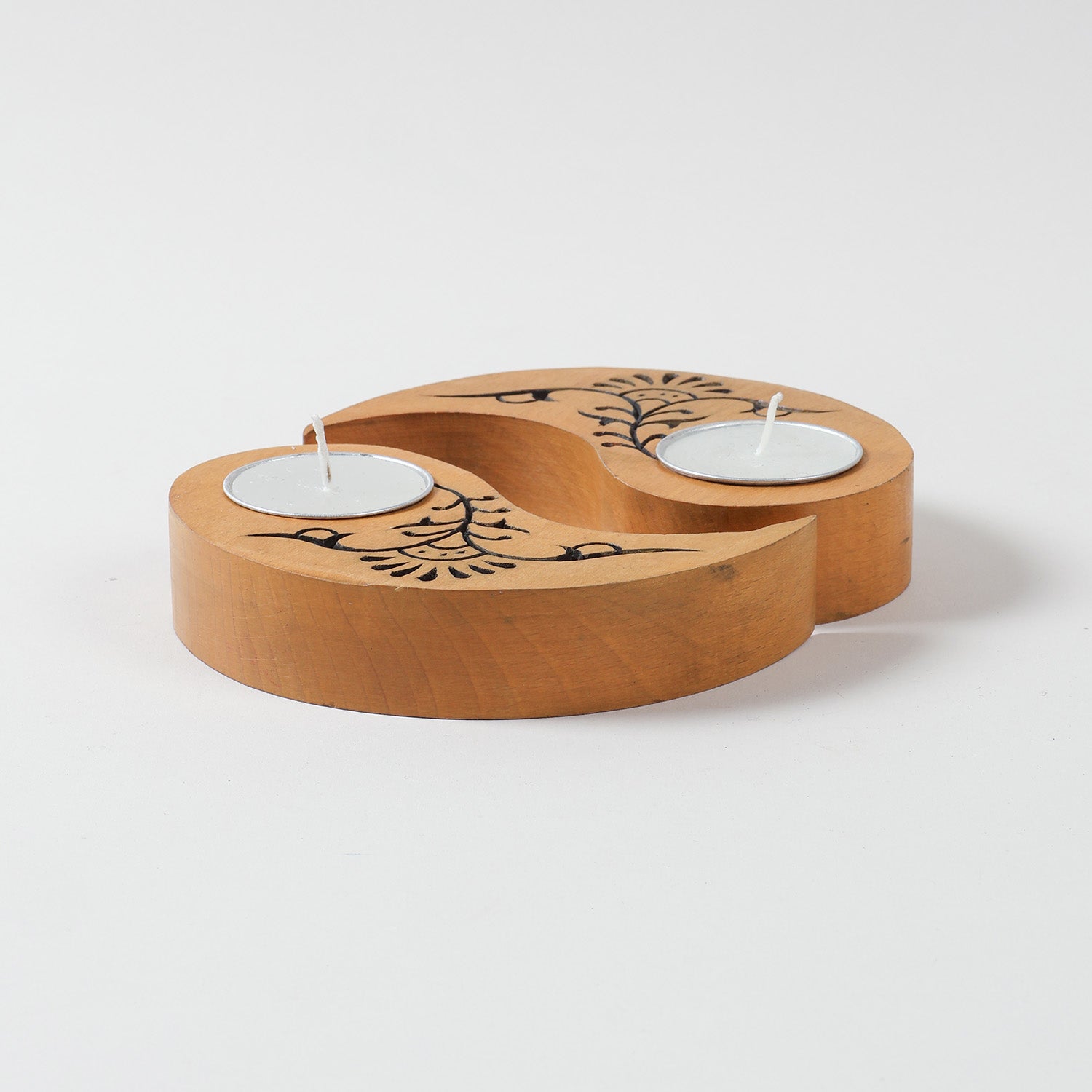 Yellow wooden T-light holders set of 2 featuring hand carved floral motifs and Ying Yang design, displayed on a plain background without candles
